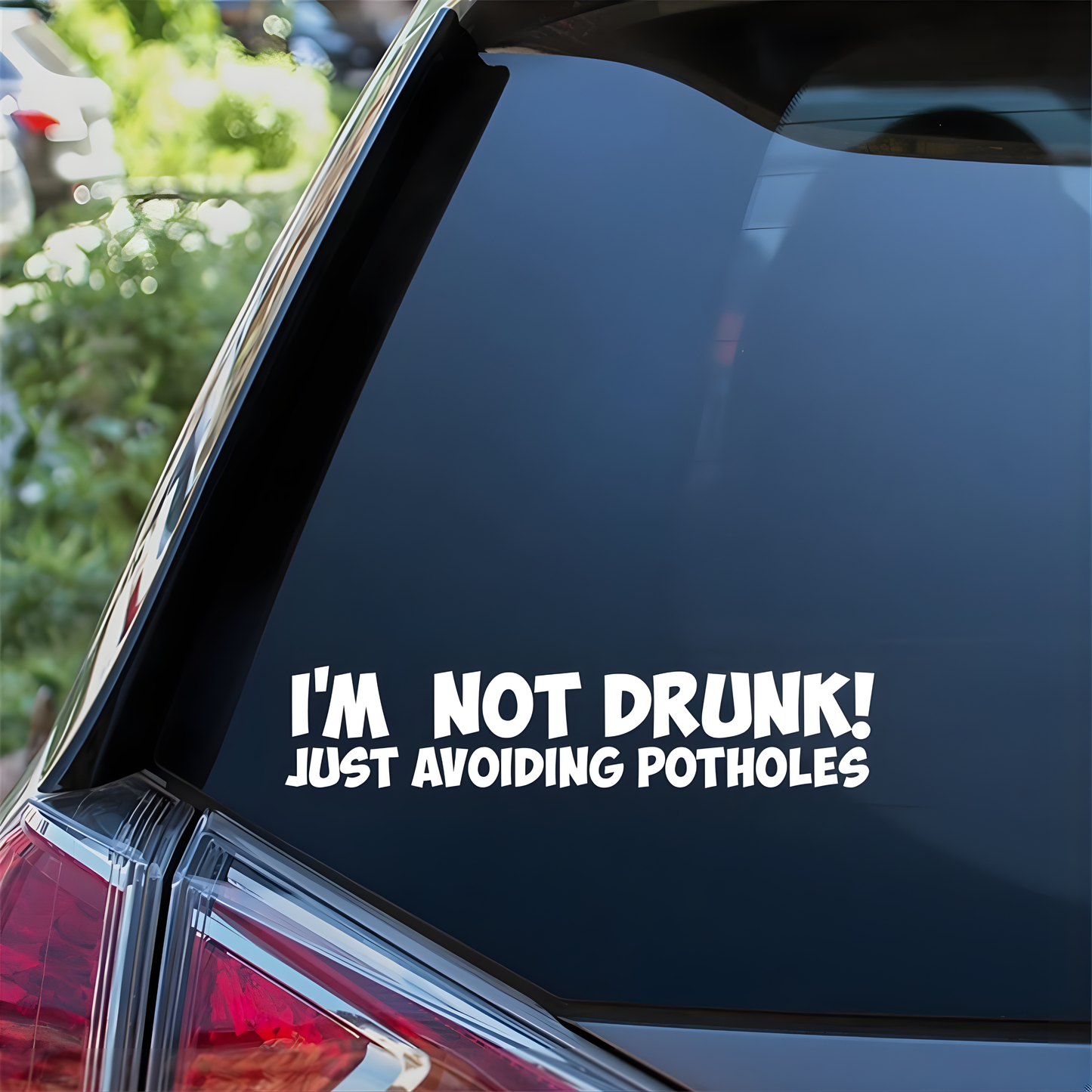 "I'm not drunk just avoiding potholes" vinyl decal/sticker